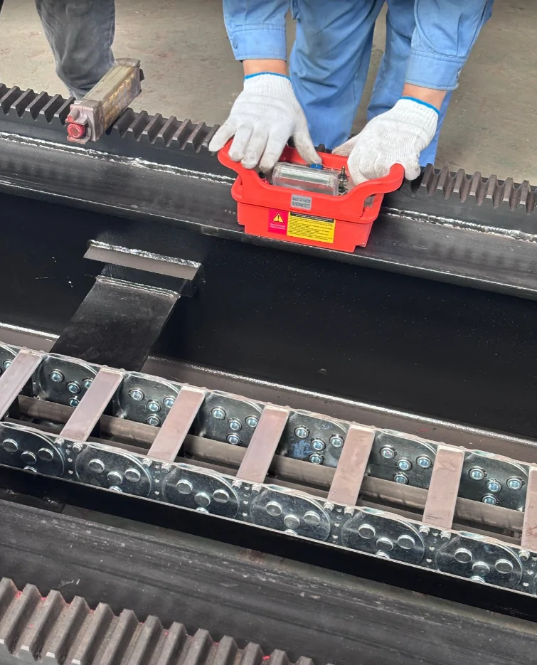 A Qingwei technician checking the level of the tube bundle extractor guide rail