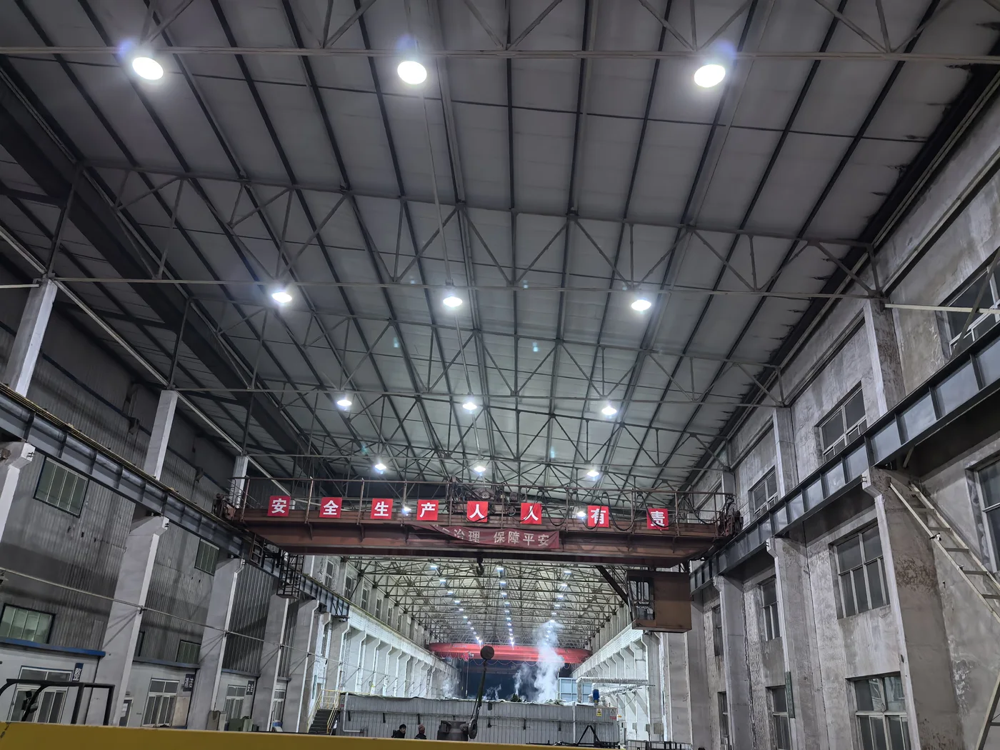 Qingwei manufacturing workshop interior with overhead cranes